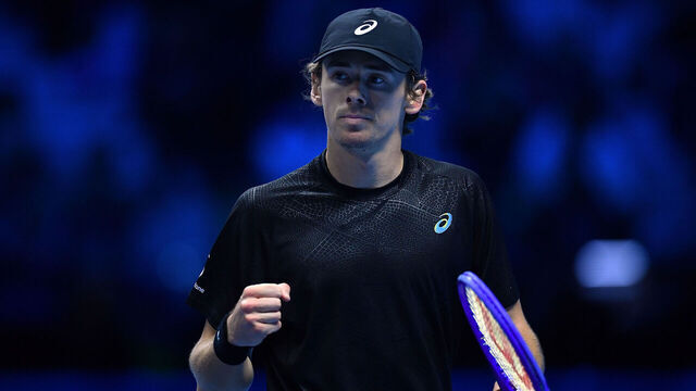 TURIN, ITALY - NOVEMBER 13: Alex de Minaur of Australia celebrates a point against Taylor Fritz of the United States during the Men's Singles Group Stage match on day five of the Nitto ATP Finals 2025 at Inalpi Arena on November 13, 2025 in Turin, Italy.