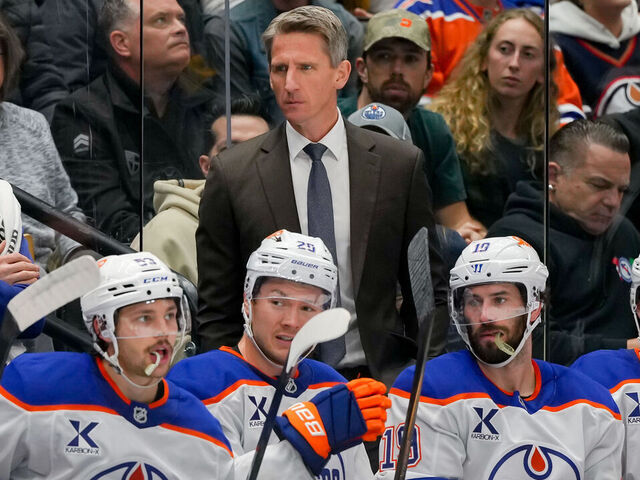 VANCOUVER, CANADA - OCTOBER 26: Edmonton Oilers head coach Kris Knoblauch looks on during the second period of their NHL game against the Vancouver Canucks at Rogers Arena on October 26, 2025 in Vancouver, British Columbia, Canada.