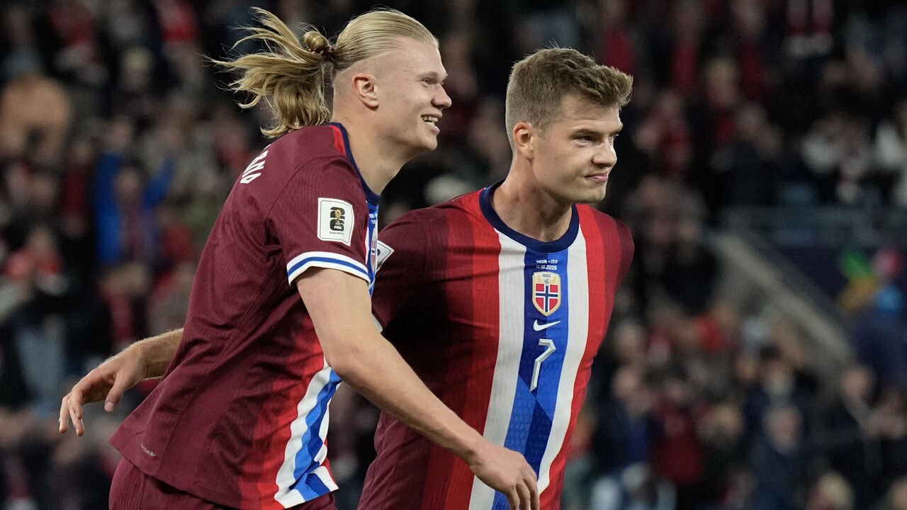 Norway's forward #09 Erling Braut Haaland (L) celebrates scoring his second goal the 4-0 with his teammate Norway's forward #07 Alexander Sorloth during the 2026 World Cup qualifiers Europe zone group I football match between Norway and Israel on October 11, 2025 in Oslo, Norway.