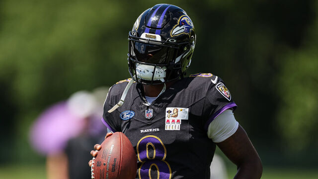 OWINGS MILLS, MD - AUGUST 12: Lamar Jackson #8 of the Baltimore Ravens participates in a drill during training camp at Under Armour Performance Center Baltimore Ravens on August 12, 2024 in Owings Mills, Maryland.