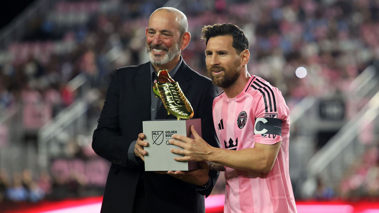 FORT LAUDERDALE, FLORIDA - OCTOBER 24: Lionel Messi #10 of Inter Miami CF receives the MLS Golden Boot from Don Garber,Commissioner of Major League Soccer, prior to the 2025 MLS Cup Playoff match between Inter Miami CF and Nashville SC at Chase Stadium on October 24, 2025 in Fort Lauderdale, Florida.