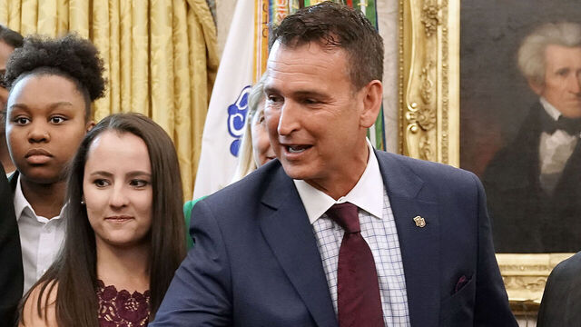 WASHINGTON, DC - APRIL 29: U.S. President Donald Trump greets Baylor University Vice President and Director of Athletics Mack Rhoades as the university women’s NCAA championship basketball team visits the Oval Office at the White House April 29, 2019 in Washington, DC. Although the NCAA champion University of Virginia men's basketball team is skipping a visit to the White House, the Baylor players visited the Oval Office three weeks after winning its third national title with an 82-81 victory over Notre Dame.