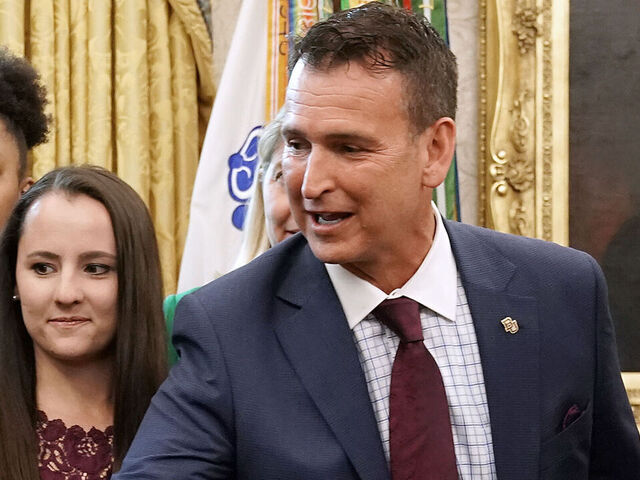 WASHINGTON, DC - APRIL 29: U.S. President Donald Trump greets Baylor University Vice President and Director of Athletics Mack Rhoades as the university women’s NCAA championship basketball team visits the Oval Office at the White House April 29, 2019 in Washington, DC. Although the NCAA champion University of Virginia men's basketball team is skipping a visit to the White House, the Baylor players visited the Oval Office three weeks after winning its third national title with an 82-81 victory over Notre Dame.
