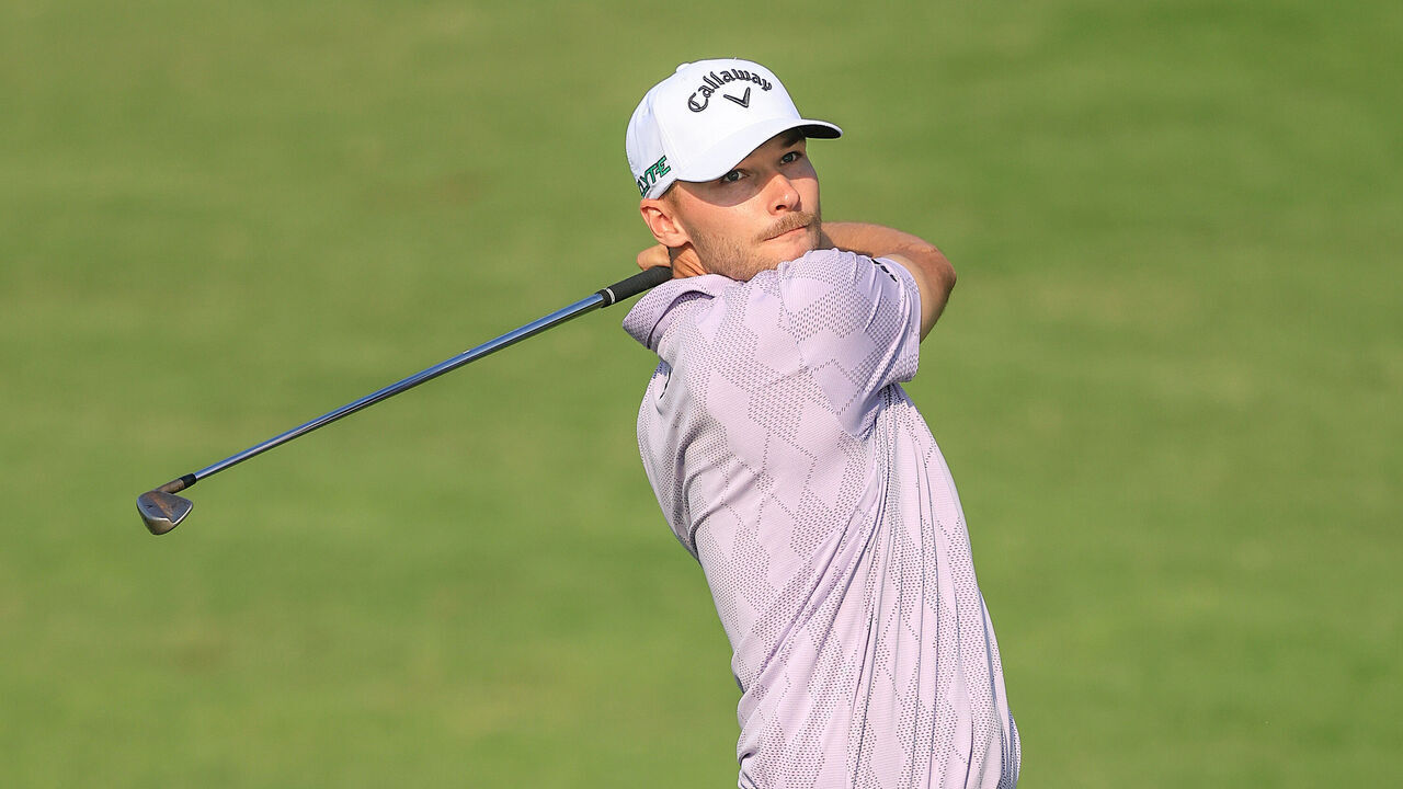DUBAI, UNITED ARAB EMIRATES - NOVEMBER 14: Nicolai Hojgaard of Denmark plays his second shot on the 14th hole during the second round of the DP World Tour Championship 2025 at Jumeirah Golf Estates on November 14, 2025 in Dubai, United Arab Emirates.