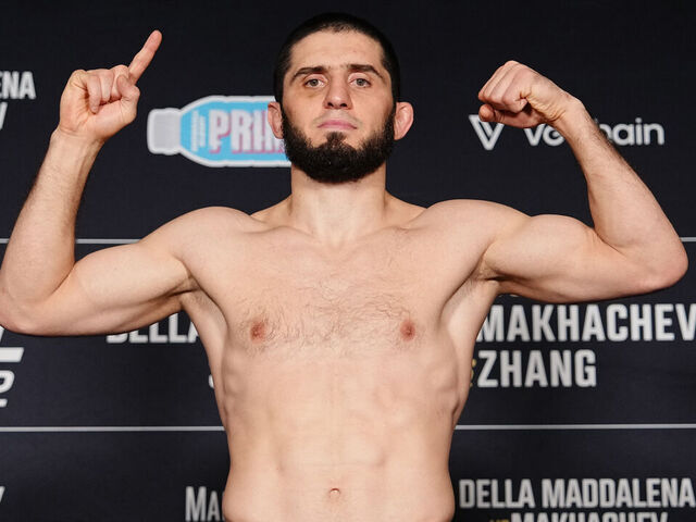 NEW YORK, NEW YORK - NOVEMBER 14: Islam Makhachev of Russia poses on the scale during the UFC 322 official weigh-ins at New York Hilton Midtown on November 14, 2025 in New York, New York.