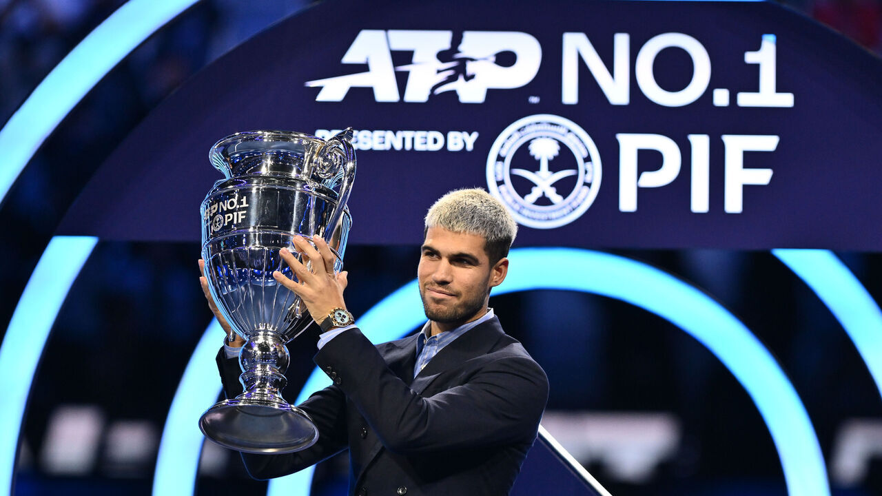Carlos Alcaraz (ESP) holds the 2025 Year-End ATP World No.1 Trophy presented by PIF during day six of the Nitto ATP Finals 2025 at Inalpi Arena in Turin, Italy, on November 14, 2025 .