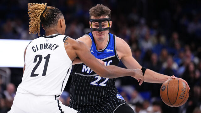 ORLANDO, FLORIDA - NOVEMBER 14: Franz Wagner #22 of the Orlando Magic dribbles the ball against Noah Clowney #21 of the Brooklyn Nets during the third quarter of the NBA Cup game at Kia Center on November 14, 2025 in Orlando, Florida. NOTE TO USER: User expressly acknowledges and agrees that, by downloading and/or using this photograph, user is consenting to the terms and conditions of the Getty Images License Agreement.