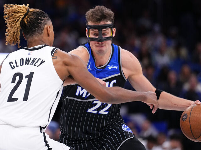 ORLANDO, FLORIDA - NOVEMBER 14: Franz Wagner #22 of the Orlando Magic dribbles the ball against Noah Clowney #21 of the Brooklyn Nets during the third quarter of the NBA Cup game at Kia Center on November 14, 2025 in Orlando, Florida. NOTE TO USER: User expressly acknowledges and agrees that, by downloading and/or using this photograph, user is consenting to the terms and conditions of the Getty Images License Agreement.