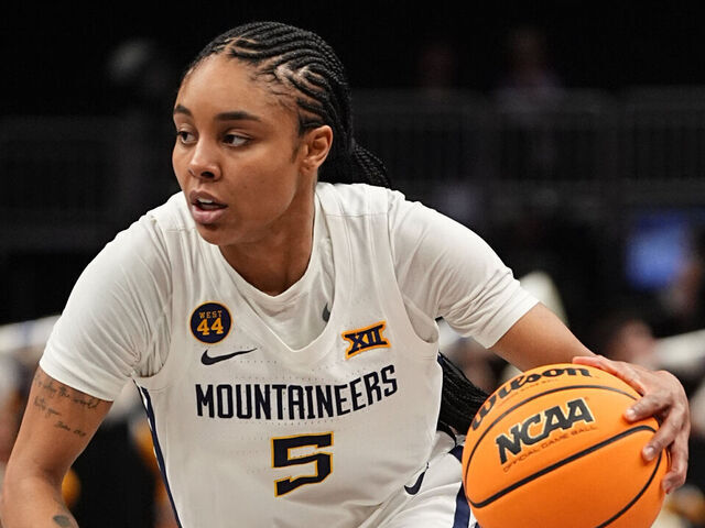 KANSAS CITY, MISSOURI - MARCH 7: Sydney Shaw #5 of the West Virginia Mountaineers goes to the basket against the Kansas State Wildcats. during the first half in the quarterfinal round of the womens Big 12 Championship at T-Mobile Center on March 7, 2025 in Kansas City, Missouri.