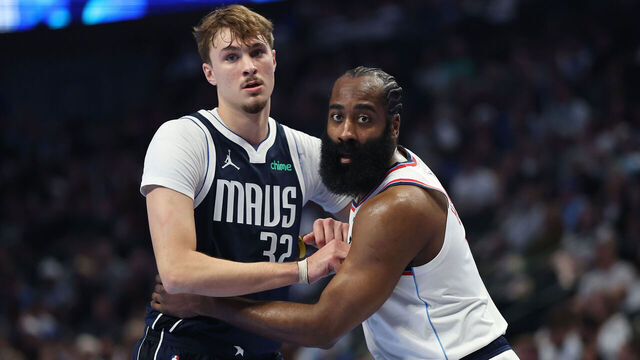 DALLAS, TEXAS - NOVEMBER 14: Cooper Flagg #32 of the Dallas Mavericks works against James Harden #1 of the LA Clippers during the first half of a 2025-26 Emirates NBA Cup game at American Airlines Center on November 14, 2025 in Dallas, Texas.
