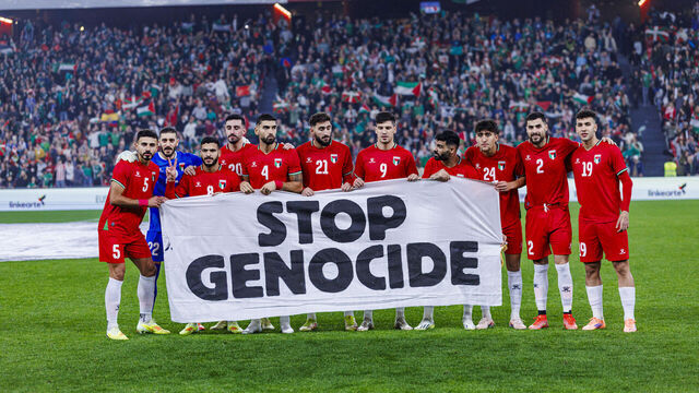 BILBAO, SPAIN - NOVEMBER 15: Players of Palestine holding a banner reading 'Stop Genocide' are seen in the pitch ahead of the friendly football match between Basque Country and Palestine at San Mames Stadium in Bilbao, Spain on November 15, 2025.