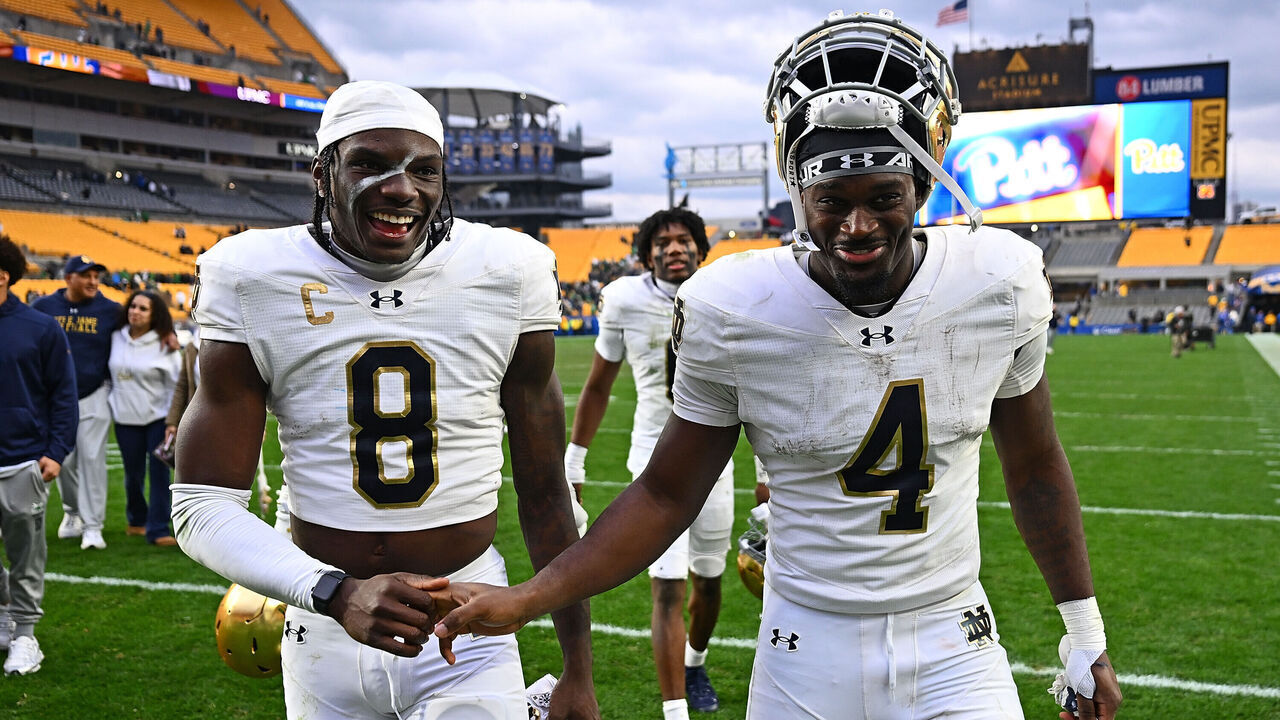 PITTSBURGH, PENNSYLVANIA - NOVEMBER 15: Jeremiyah Love #4 of the Notre Dame Fighting Irish celebrates with Adon Shuler #8 as they walk off the field following a 37-15 win over the Pittsburgh Panthers during the game at Acrisure Stadium on November 15, 2025 in Pittsburgh, Pennsylvania.