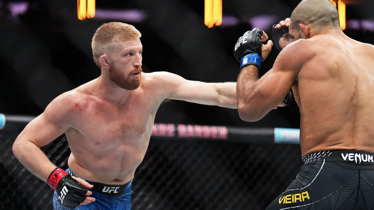 NEW YORK, NEW YORK - NOVEMBER 15: (L-R) Rodolfo Vieira of Brazil strikes Bo Nickal in a middleweight fight during the UFC 322 event at Madison Square Garden on November 15, 2025 in New York City.