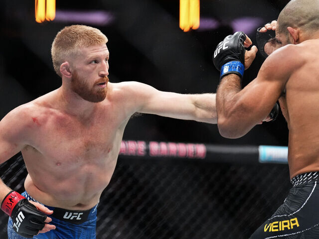 NEW YORK, NEW YORK - NOVEMBER 15: (L-R) Rodolfo Vieira of Brazil strikes Bo Nickal in a middleweight fight during the UFC 322 event at Madison Square Garden on November 15, 2025 in New York City.