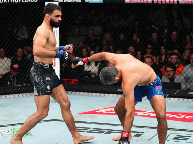 NEW YORK, NEW YORK - NOVEMBER 15: (L-R) Benoit Saint Denis of France strikes Beneil Dariush of Iran in a lightweight fight during the UFC 322 event at Madison Square Garden on November 15, 2025 in New York City.