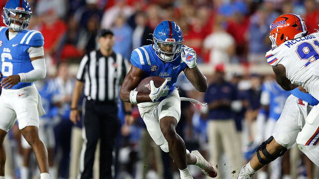 OXFORD, MISSISSIPPI - NOVEMBER 15: Kewan Lacy #5 of the Mississippi Rebels carries the ball during the first half against the Florida Gators at Vaught-Hemingway Stadium on November 15, 2025 in Oxford, Mississippi.