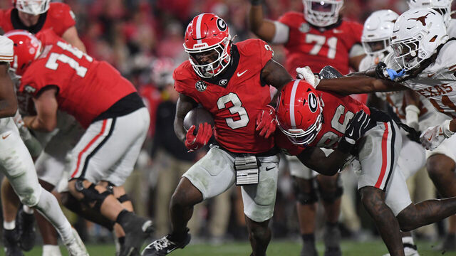ATHENS, GA - NOVEMBER 15: Running back Nate Frazier #3 of the Georgia Bulldogs rushes the ball during the college football game between the Texas Longhorns and the Georgia Bulldogs on November 15, 2025, at Sanford Stadium in Athens, GA.