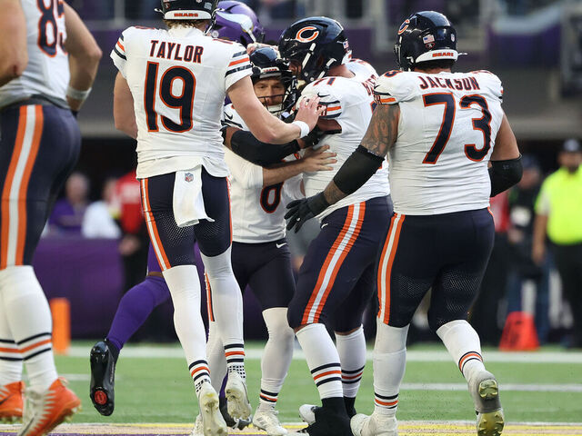 MINNEAPOLIS, MINNESOTA - NOVEMBER 16: Cairo Santos #8 of the Chicago Bears celebrates with the team after kicking the game-winning field goal to beat the Minnesota Vikings 19-17 at U.S. Bank Stadium on November 16, 2025 in Minneapolis, Minnesota.