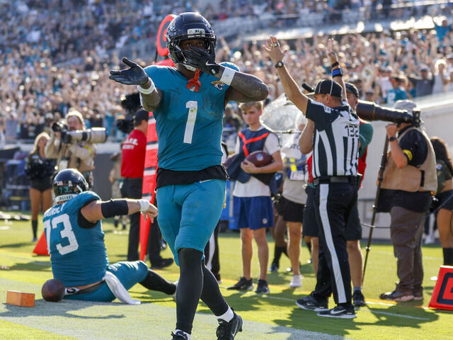 JACKSONVILLE, FL - NOVEMBER 16: Jacksonville Jaguars running back Travis Etienne Jr. (1) reacts after scoring a touchdown during the game between the Jacksonville Jaguars and the Los Angeles Chargers on November 16, 2025 at EverBank Stadium in Jacksonville, Fl.