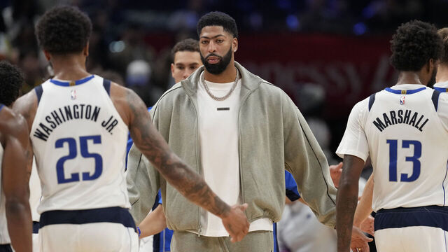 WASHINGTON, DC - NOVEMBER 08: Anthony Davis #3 of the Dallas Mavericks high fives teammates during a timeout in the second half against the Washington Wizards at Capital One Arena on November 08, 2025 in Washington, DC.