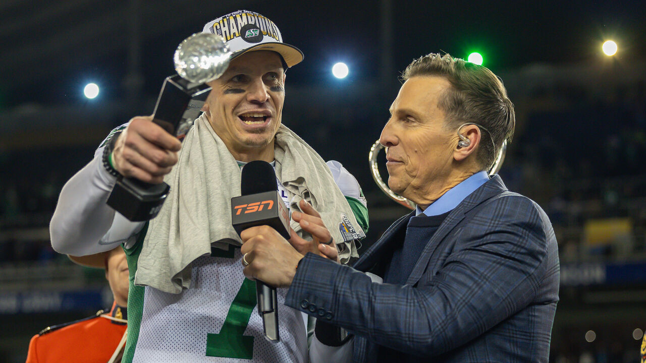 WINNIPEG, CANADA - NOVEMBER 16: Trevor Harris #7 of the Saskatchewan Roughriders is presented with the most valuable player award for the 112th Grey Cup game between the Montreal Alouettes and Saskatchewan Roughriders at Princess Auto Stadium on November 16, 2025 in Winnipeg, Canada.