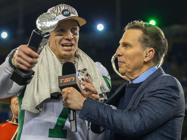 WINNIPEG, CANADA - NOVEMBER 16: Trevor Harris #7 of the Saskatchewan Roughriders is presented with the most valuable player award for the 112th Grey Cup game between the Montreal Alouettes and Saskatchewan Roughriders at Princess Auto Stadium on November 16, 2025 in Winnipeg, Canada.