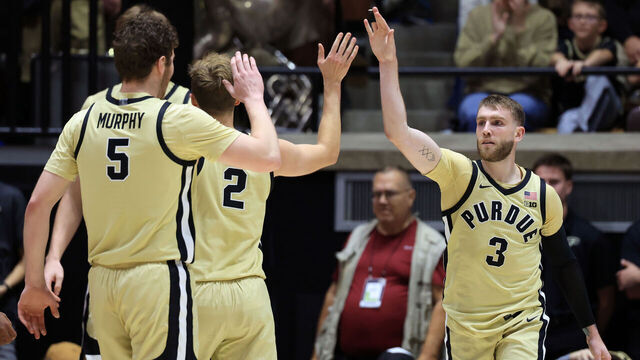 WEST LAFAYETTE, INDIANA - NOVEMBER 07: Braden Smith #3 of the Purdue Boilermakers reacts after being fouled with Fletcher Loyer #2 and Liam Murphy #5 during the first half against the Oakland Golden Grizzlies at Mackey Arena on November 07, 2025 in West Lafayette, Indiana.