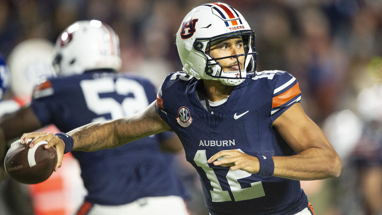 AUBURN, ALABAMA - NOVEMBER 01: Quarterback Ashton Daniels #12 of the Auburn Tigers looks to throw the ball during the first half of their game against the Kentucky Wildcats at Jordan-Hare Stadium on November 01, 2025 in Auburn, Alabama.