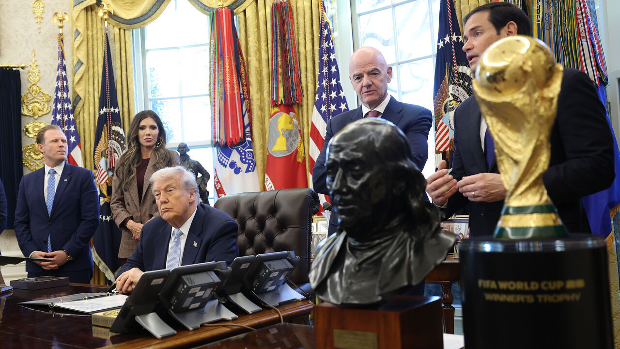 WASHINGTON, DC - NOVEMBER 17: U.S. Secretary of State Marco Rubio (R), joined by FIFA President Gianni Infantino and U.S. President Donald Trump speaks alongside U.S. President Donald Trump during a meeting of the White House Task Force on the FIFA World Cup 2026 in the Oval Office of the White House on November 17, 2025 in Washington, DC. The task force was created to oversee security, logistics, and federal government support for the 2025 Club World Cup and the 2026 FIFA World Cup, jointly hosted by the United States. Andrew Giuliani and Secretary of Homeland Security Kristie Noem also joined the meeting.