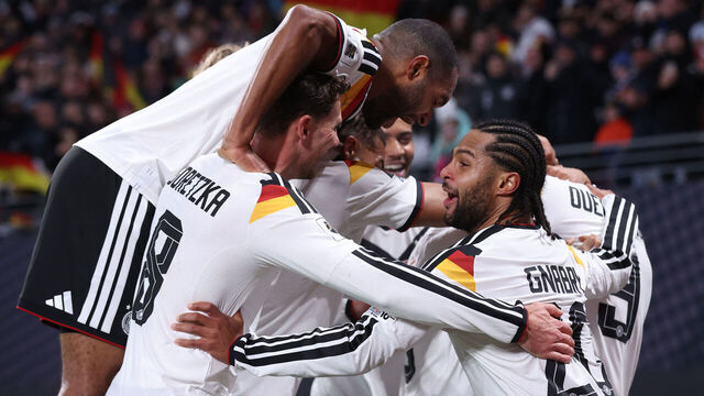Germany's players celebrate after midfielder #09 Assan Ouedraogo scored his team's sixth goal during the FIFA World Cup 2026 European qualification Group A football match between Germany and Slovakia, at the Red Bull Arena in Leipzig, eastern Germany on November 17, 2025.