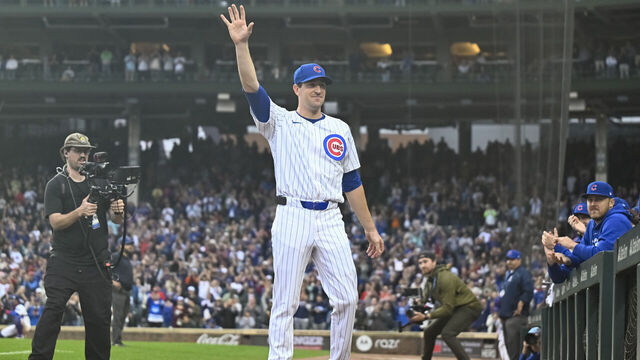 CHICAGO, ILLINOIS - SEPTEMBER 28: Starting pitcher Kyle Hendricks #28 of the Chicago Cubs waves to the crowd after being relieved in the eighth inning against the Cincinnati Reds at Wrigley Field on September 28, 2024 in Chicago, Illinois.