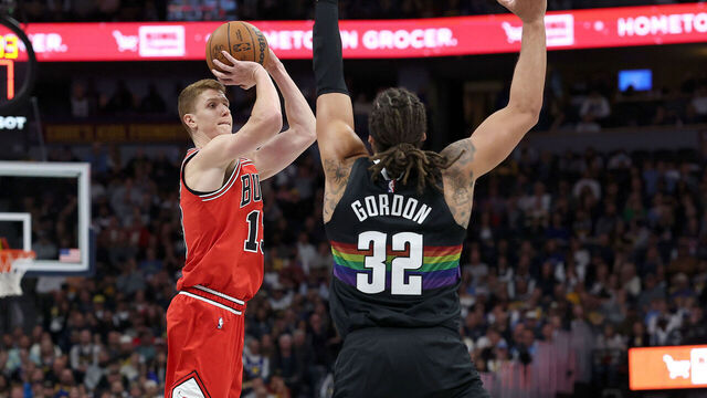 DENVER, COLORADO - NOVEMBER 17: Kevin Huerter #13 of the Chicago Bulls puts up a shot against Aaron Gordon #32 of the Denver Nuggets in the fourth quarter at Ball Arena on November 17, 2025 in Denver, Colorado.