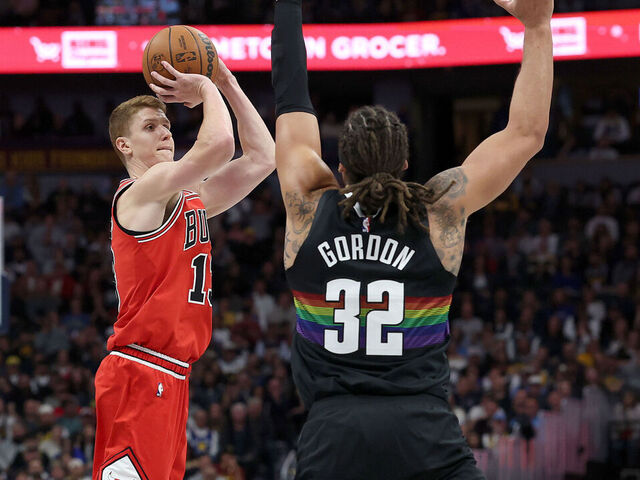DENVER, COLORADO - NOVEMBER 17: Kevin Huerter #13 of the Chicago Bulls puts up a shot against Aaron Gordon #32 of the Denver Nuggets in the fourth quarter at Ball Arena on November 17, 2025 in Denver, Colorado.