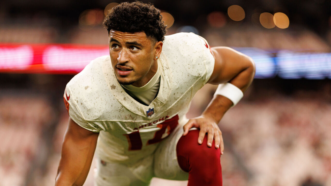 GLENDALE, ARIZONA - SEPTEMBER 25: Michael Wilson #14 of the Arizona Cardinals stretches on the field prior to an NFL football game against the Seattle Seahawks at State Farm Stadium on September 25, 2025 in Glendale, Arizona.
