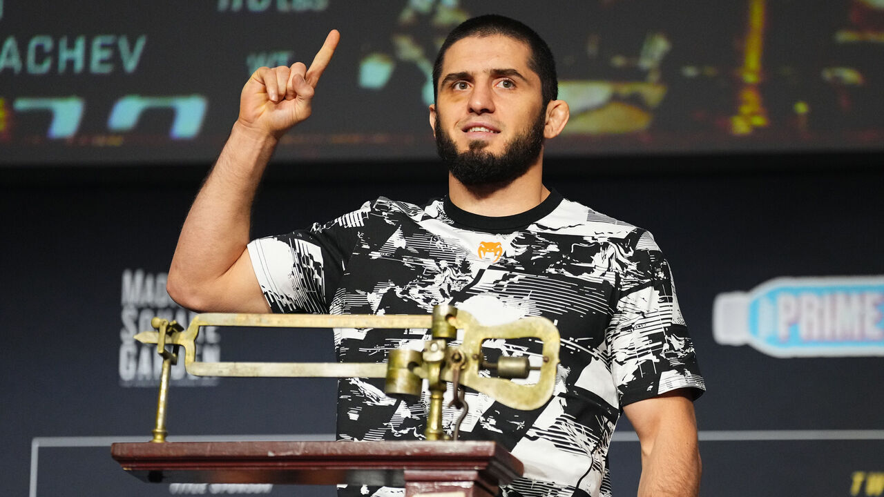 NEW YORK, NEW YORK - NOVEMBER 14: Islam Makhachev of Russia poses on the scale during the UFC 322 ceremonial weigh-in at The Theater at Madison Square Garden on November 14, 2025 in New York City.