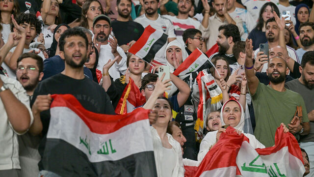ABU DHABI, UNITED ARAB EMIRATES - NOVEMBER 13: Iraqi fans cheer at the stands during the first match of the fifth round of the 2026 FIFA World Cup Asian Qualifiers between United Arab Emirates and Iraq at the Mohammed bin Zayed Stadium in Abu Dhabi, United Arab Emirates, on November 13, 2025.