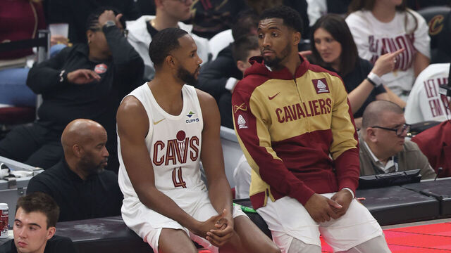 CLEVELAND, OH - APRIL 20: Evan Mobley #4 and Donovan Mitchell #45 of the Cleveland Cavaliers look on during the game against the Miami Heat during Round 1 Game 1 of the 2025 NBA Playoffs on April 20, 2025 at Rocket Mortgage FieldHouse in Cleveland, Ohio. NOTE TO USER: User expressly acknowledges and agrees that, by downloading and/or using this Photograph, user is consenting to the terms and conditions of the Getty Images License Agreement. Mandatory Copyright Notice: Copyright 2025 NBAE