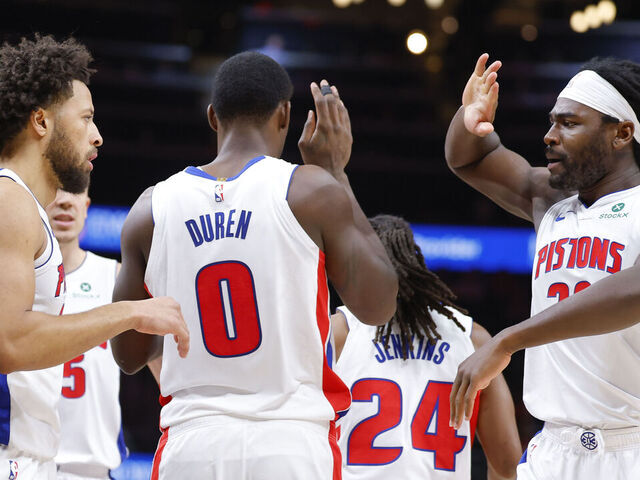 ATLANTA, GEORGIA - NOVEMBER 18: Cade Cunningham #2, Jalen Duren #0 and Isaiah Stewart #28 of the Detroit Pistons react during the first quarter against the Atlanta Hawks at State Farm Arena on November 18, 2025 in Atlanta, Georgia.