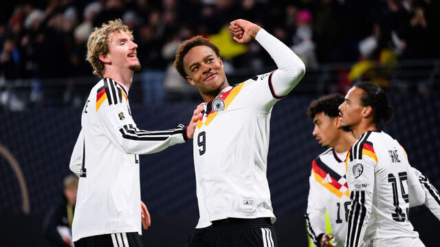 LEIPZIG, GERMANY - NOVEMBER 17: Forzan Assan Ouedraogo of Germany celebrates after scoring his team's sixth goal with Nick Woltemade (L) during the FIFA World Cup 2026 qualifier match between Germany and Slovakia at Red Bull Arena on November 17, 2025 in Leipzig, Germany.