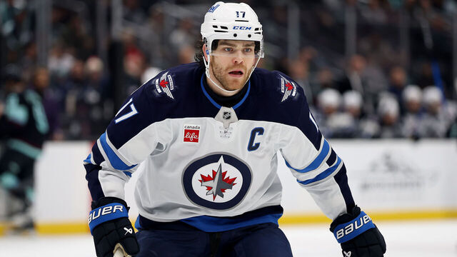 SEATTLE, WASHINGTON - NOVEMBER 13: Adam Lowry #17 of the Winnipeg Jets looks on against the Seattle Kraken during the third period at Climate Pledge Arena on November 13, 2025 in Seattle, Washington.