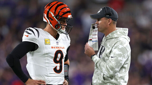 BALTIMORE, MARYLAND - NOVEMBER 07: Joe Burrow #9 and head coach Zac Taylor of the Cincinnati Bengals speak during the first quarter against the Baltimore Ravens at M&T Bank Stadium on November 07, 2024 in Baltimore, Maryland.