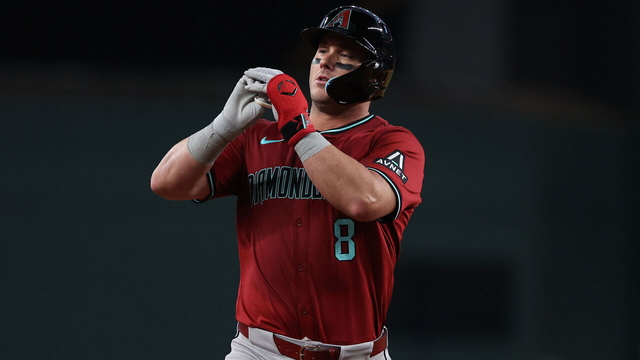 ARLINGTON, TEXAS - AUGUST 13: James McCann #8 of the Arizona Diamondbacks runs the bases on his ninth inning home run against the Texas Rangers at Globe Life Field on August 13, 2025 in Arlington, Texas.
