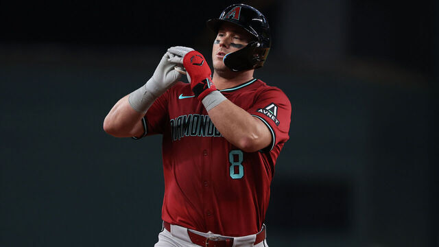 ARLINGTON, TEXAS - AUGUST 13: James McCann #8 of the Arizona Diamondbacks runs the bases on his ninth inning home run against the Texas Rangers at Globe Life Field on August 13, 2025 in Arlington, Texas.