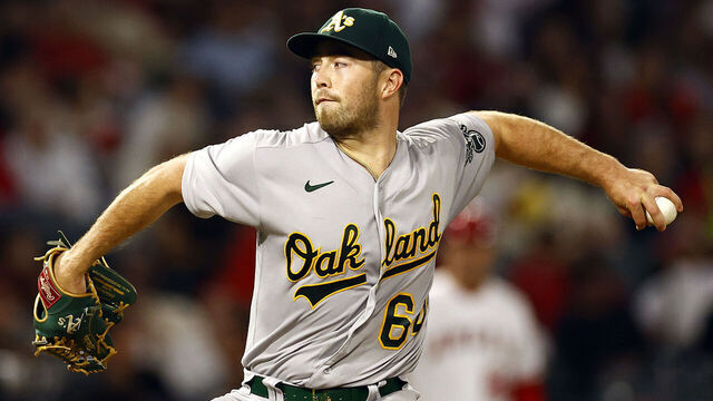 ANAHEIM, CALIFORNIA - SEPTEMBER 29: Ken Waldichuk #64 of the Oakland Athletics throws against the Los Angeles Angels in the fourth inning at Angel Stadium of Anaheim on September 29, 2023 in Anaheim, California.