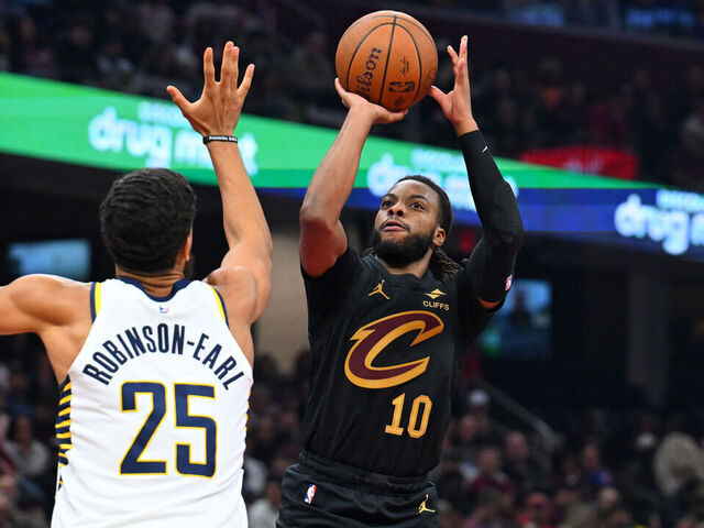CLEVELAND, OHIO - NOVEMBER 21: Darius Garland #10 of the Cleveland Cavaliers shoots over Jeremiah Robinson-Earl #25 of the Indiana Pacers during the second quarter at Rocket Arena on November 21, 2025 in Cleveland, Ohio.