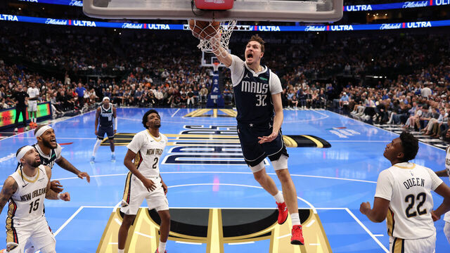 DALLAS, TX - NOVEMBER 21: Cooper Flagg #32 of the Dallas Mavericks dunks the ball during the game against the New Orleans Pelicans during the 2025-26 Emirates Cup on November 21, 2025 at American Airlines Center in Dallas, Texas. Mandatory Copyright Notice: Copyright 2025 NBAE