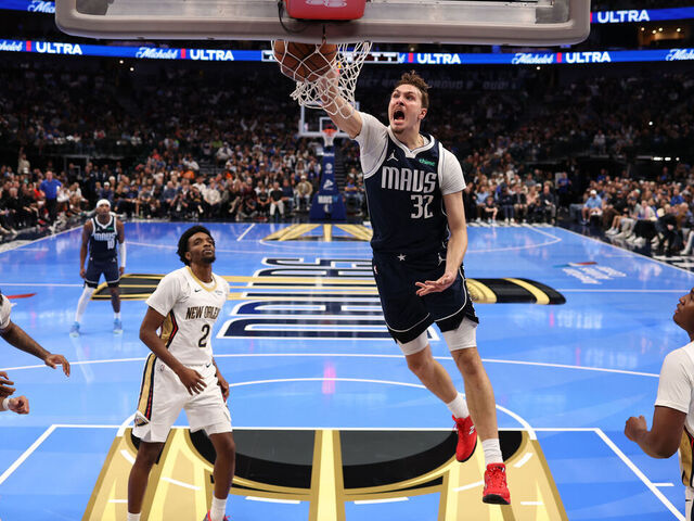 DALLAS, TX - NOVEMBER 21: Cooper Flagg #32 of the Dallas Mavericks dunks the ball during the game against the New Orleans Pelicans during the 2025-26 Emirates Cup on November 21, 2025 at American Airlines Center in Dallas, Texas. Mandatory Copyright Notice: Copyright 2025 NBAE