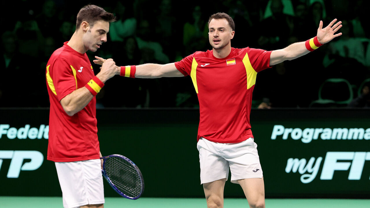 BOLOGNA, ITALY - NOVEMBER 22: Pedro Martinez and Marcel Granollers of Spain celebrate after winning their doubles match against Tim Puetz and Kevin Krawietz of Germany during the Davis Cup Semi-Final match between Spain and Germany at BolognaFiere Exhibition Centre on November 22, 2025 in Bologna, Italy.