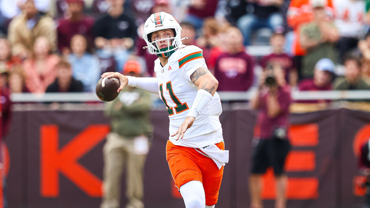 BLACKSBURG, VIRGINIA - NOVEMBER 22: Carson Beck #11 of the Miami Hurricanes throws a pass against the Virginia Tech Hokies in the first half during a game at Lane Stadium on November 22, 2025 in Blacksburg, Virginia.
