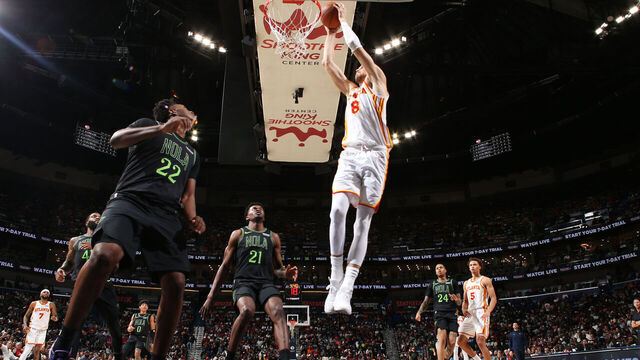 NEW ORLEANS, LA - NOVEMBER 22: Kristaps Porzingis #8 of the Atlanta Hawks dunks the ball during the game against the New Orleans Pelicans on November 22, 2025 at the Smoothie King Center in New Orleans, Louisiana. Mandatory Copyright Notice: Copyright 2025 NBAE